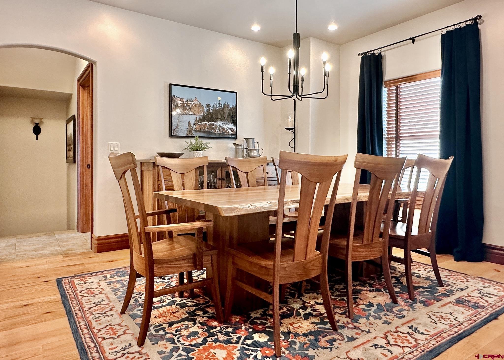 1787 Roubideau Street Delta, CO 81416 - Photo 13 of 35 a view of a dining room with furniture