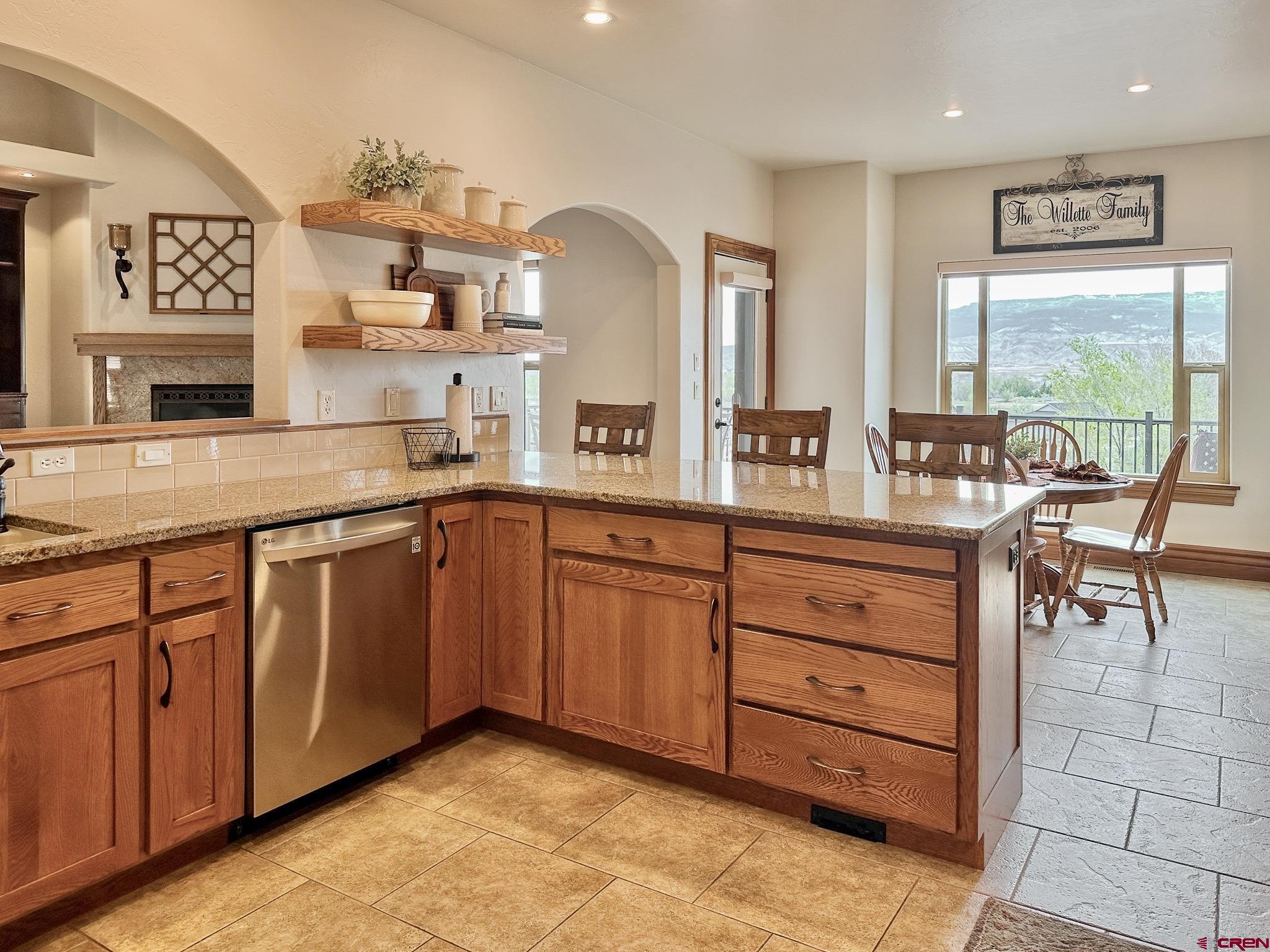 1787 Roubideau Street Delta, CO 81416 - Photo 17 of 35 a very nice looking kitchen with a large window