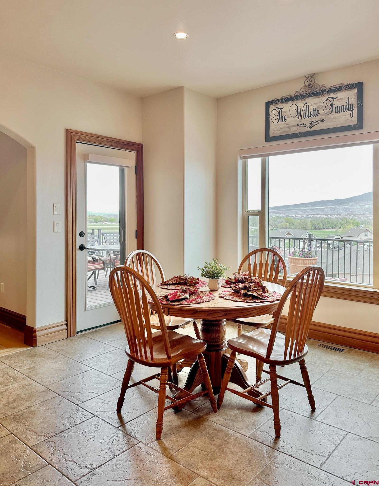 1787 Roubideau Street Delta, CO 81416 - Photo 18 of 35 a view of a dining room with furniture window and outside view