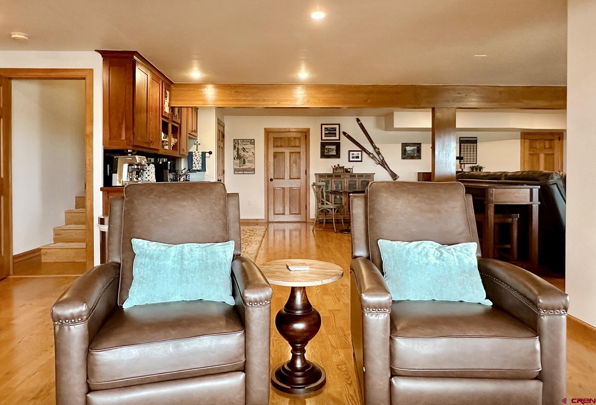 1787 Roubideau Street Delta, CO 81416 - Photo 23 of 35 a living room with furniture and a large window