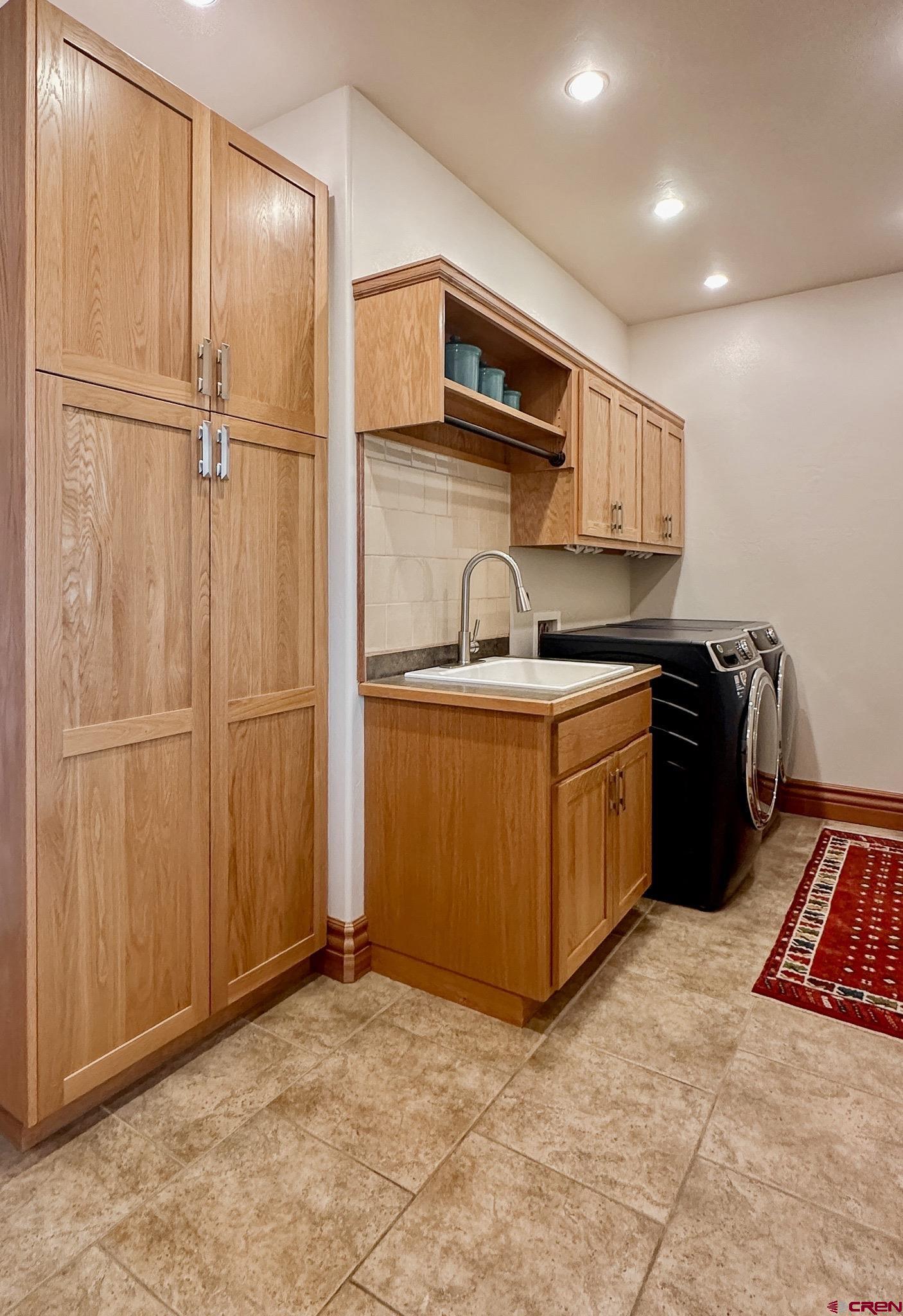 1787 Roubideau Street Delta, CO 81416 - Photo 33 of 35 a view of a kitchen with electric appliances