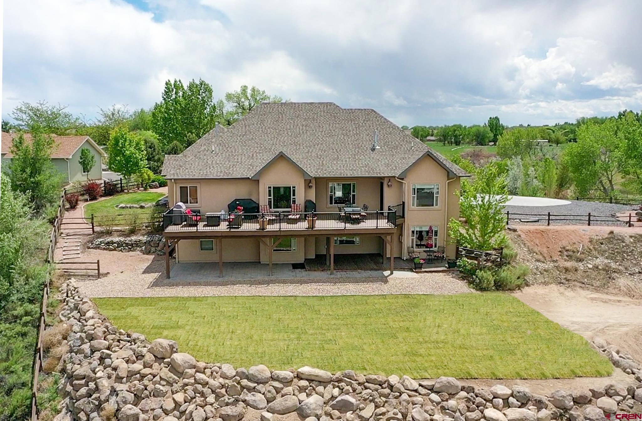 1787 Roubideau Street Delta, CO 81416 - Photo 4 of 35 a swimming pool view with a seating space and a garden view