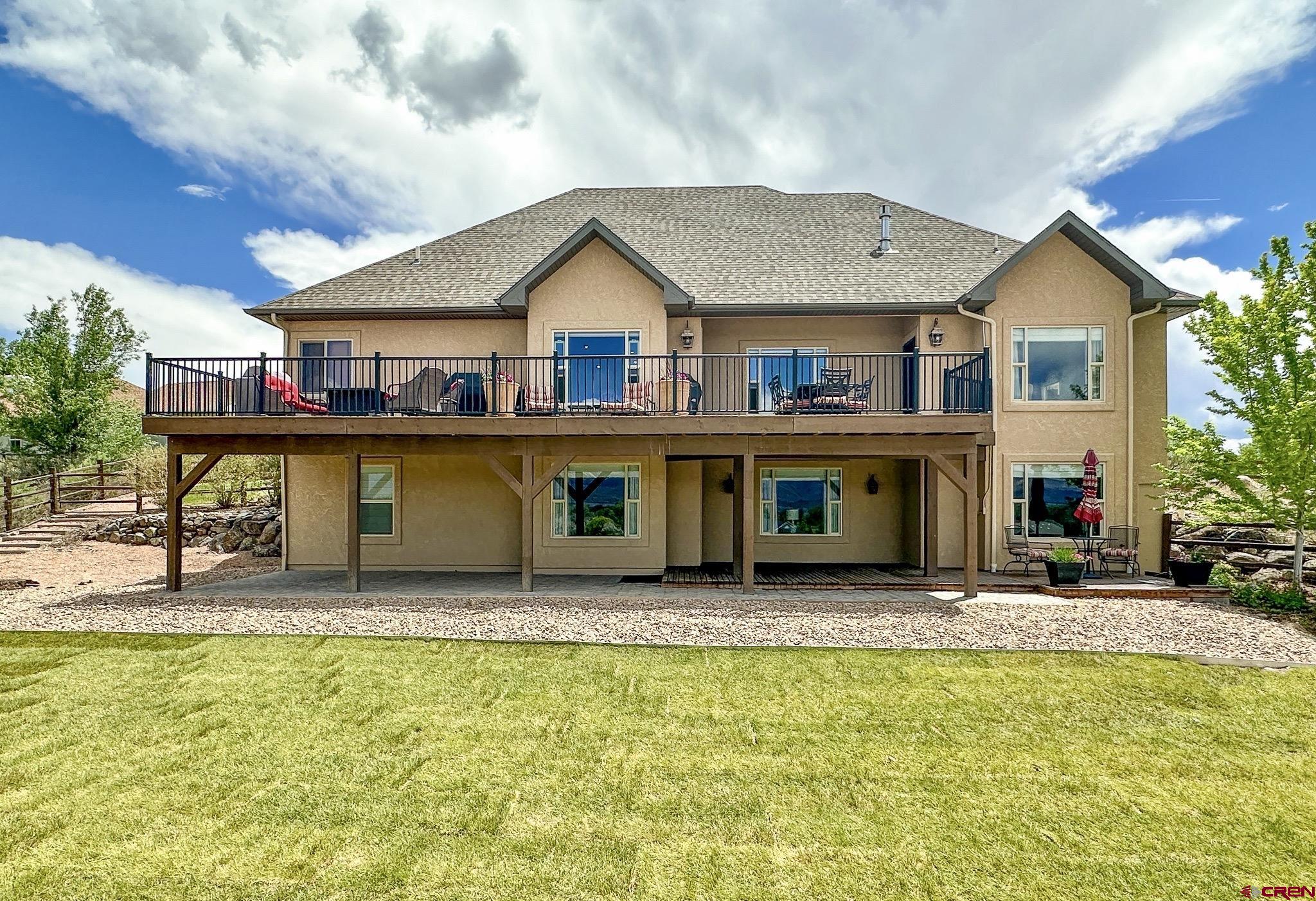 1787 Roubideau Street Delta, CO 81416 - Photo 5 of 35 a view of house with yard outdoor seating area