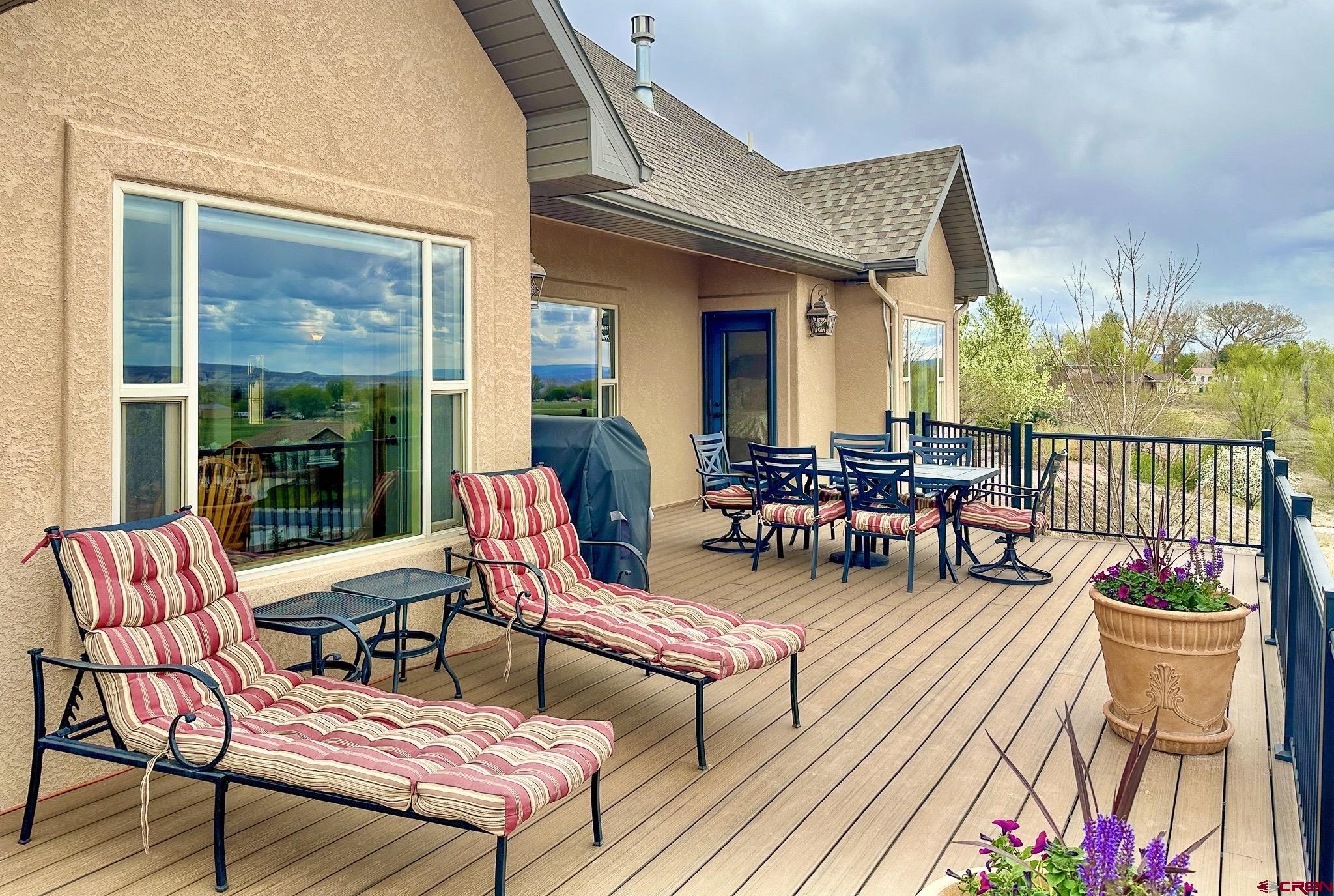 1787 Roubideau Street Delta, CO 81416 - Photo 7 of 35 a outdoor space with patio the couches and a potted plant