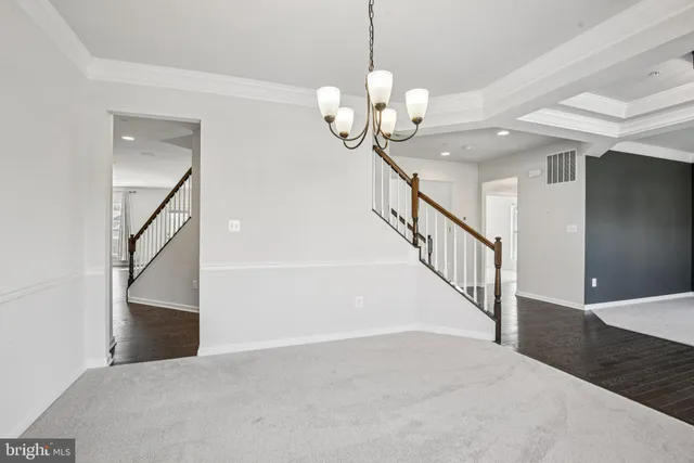 a kitchen with stainless steel appliances granite countertop a stove and a sink