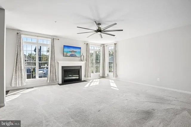 a view of a room with a large window