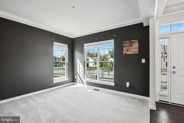 a bathroom with a tub sink shower and mirror