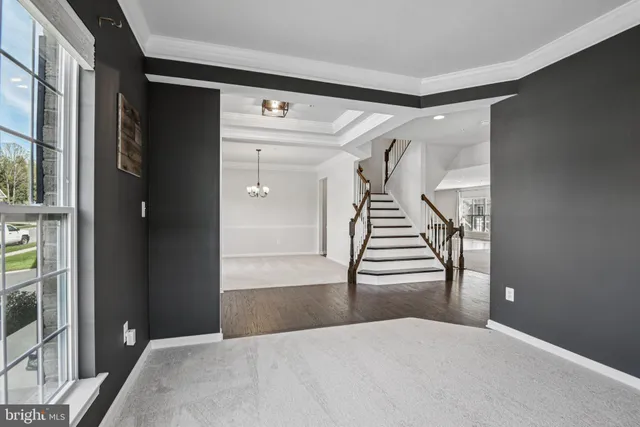 a bathroom with a double vanity sink a mirror and shower