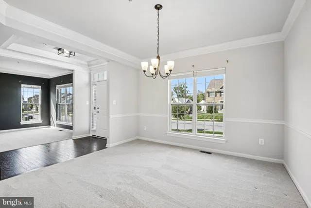 a view of livingroom with hardwood floor and a ceiling fan