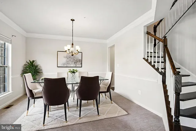 a kitchen with stainless steel appliances granite countertop a sink and stove