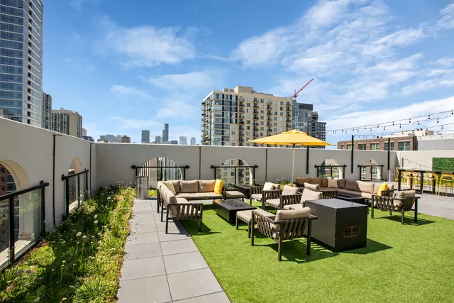 a couple of table and chairs sitting in the patio