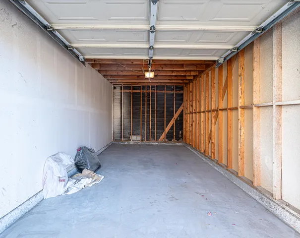 a view of staircase with rug