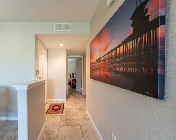 a view of a hallway with a window