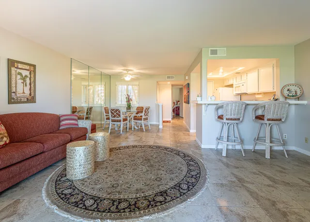 a view of a living room and livingroom with furniture