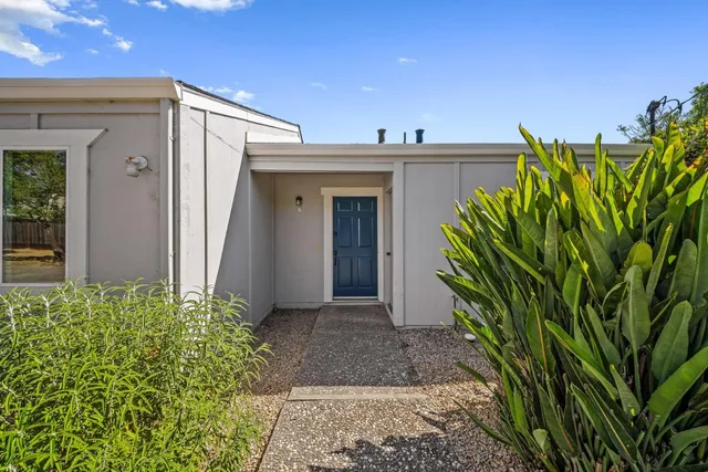 a view of a back yard of the house