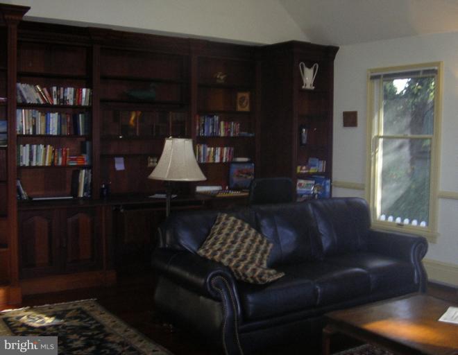 1003 Travers Street Cambridge, MD 21613 - Photo 11 of 30 Family Room with built-in bookcases