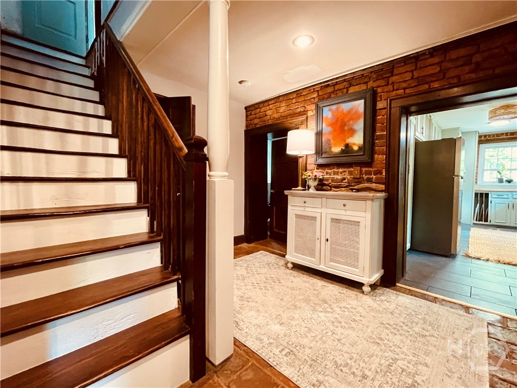 837 Bartram Trace Road Rayle, GA 30660 - Photo 30 of 70 Stairs leading up to the main floor from the lower level den