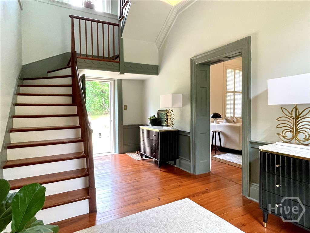 837 Bartram Trace Road Rayle, GA 30660 - Photo 10 of 70 Staircase in entry foyer showing open back door