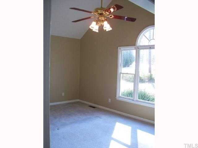 6717 Battle Bridge Road Raleigh, NC 27610 - Photo 8 of 10 a view of an empty room with a window