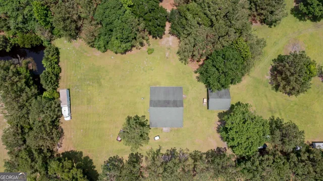 a view of a lake with a house