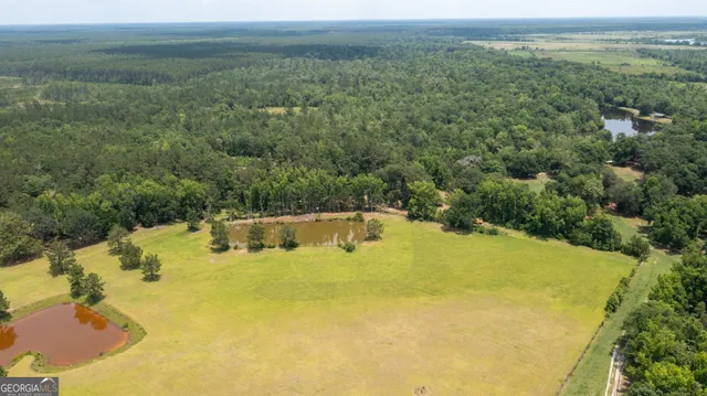 a view of a lake with a big yard