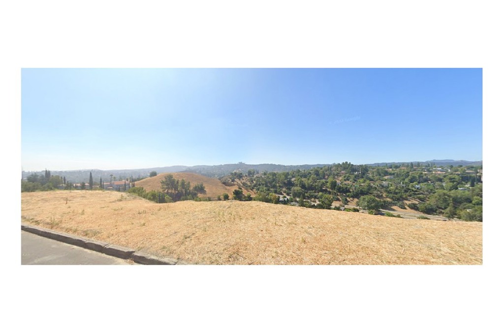22552 Uhea Road Woodland Hills, CA 91364 - Photo 8 of 8 a view of an ocean