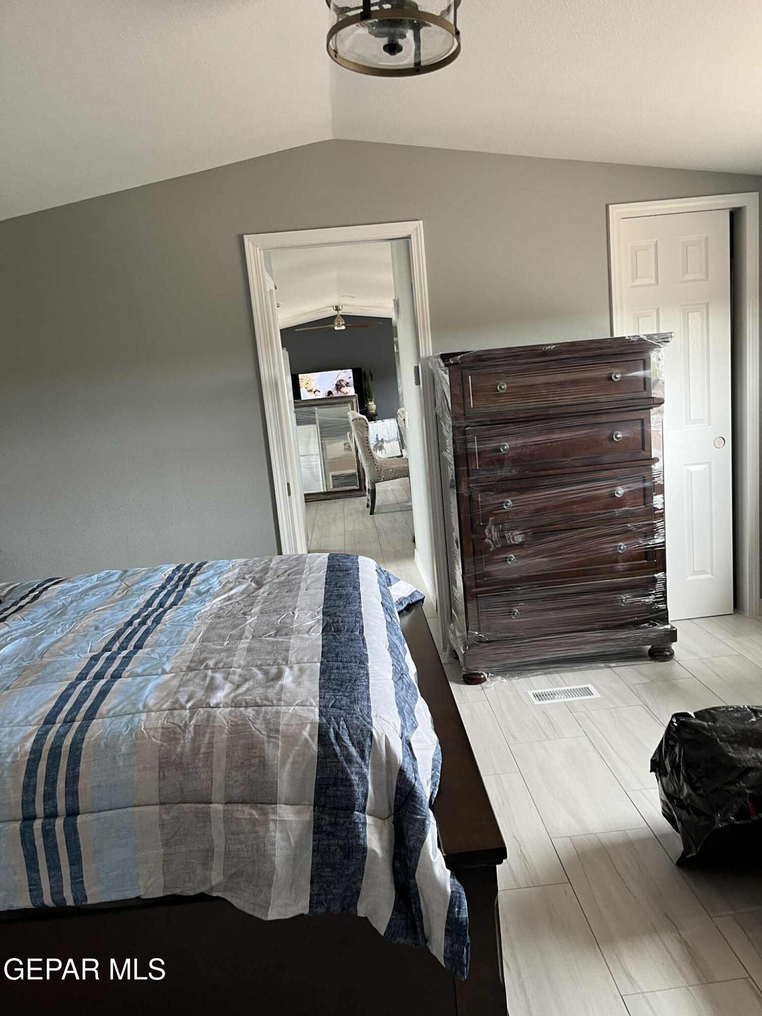 100 North Sparks Ranch Road Dell City, TX 79847 - Photo 15 of 19 a bedroom with a bed and a dresser