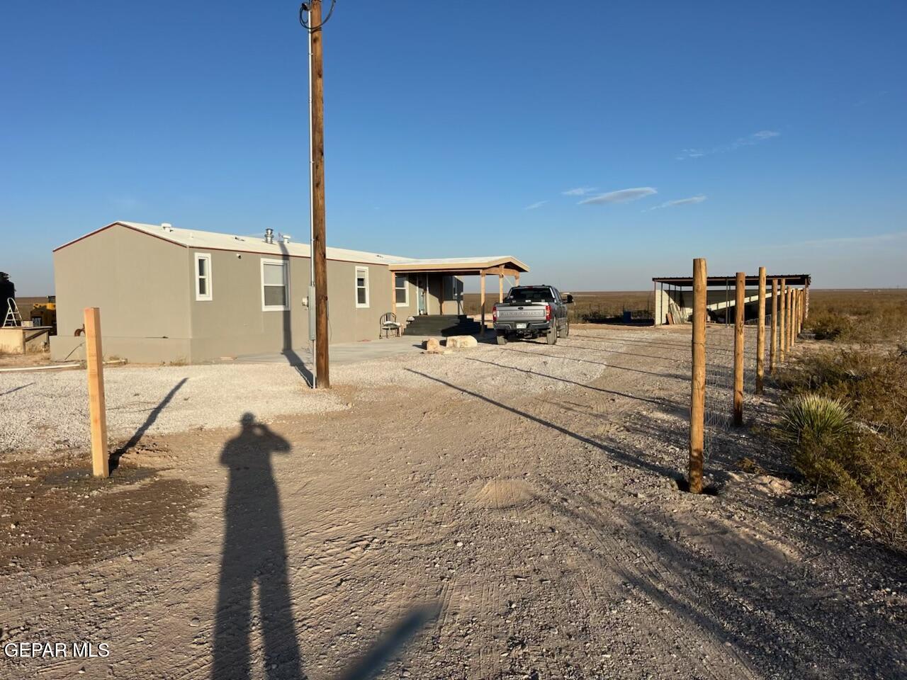 100 North Sparks Ranch Road Dell City, TX 79847 - Photo 19 of 19 a view of a terrace with wooden fence