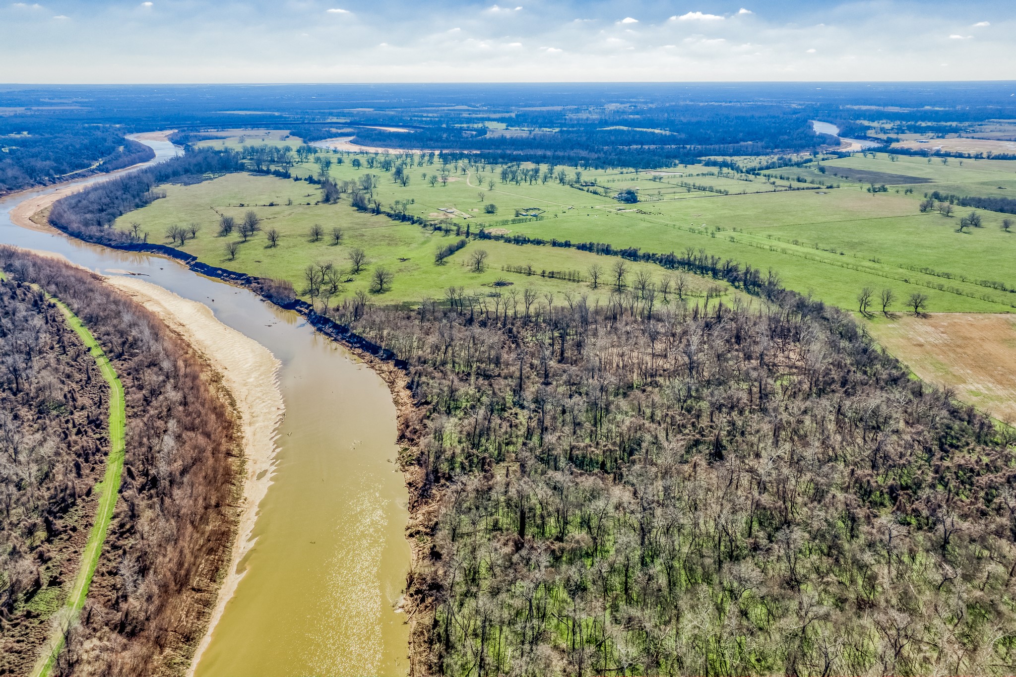 0 Steck Bottom Road Sealy, TX 77474 - Photo 2 of 15 a view of a lake with a mountain in the background