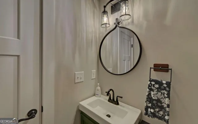 an aerial view of a house with a garden and plants