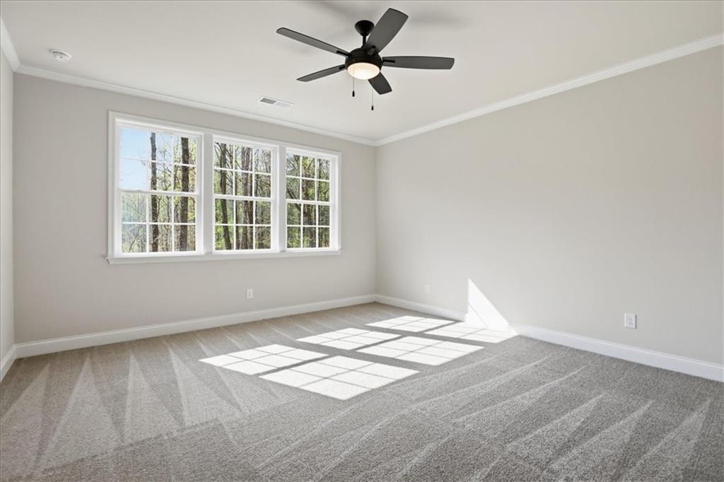 2013 Seclusion Trail Monroe, GA 30656 - Photo 30 of 63 a view of an empty room with a window
