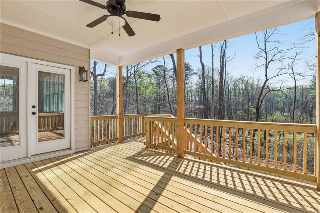 2013 Seclusion Trail Monroe, GA 30656 - Photo 58 of 63 a view of a balcony with wooden floor