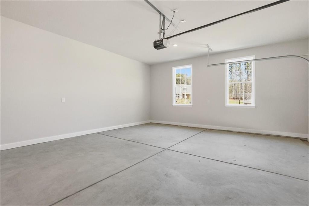 2013 Seclusion Trail Monroe, GA 30656 - Photo 59 of 63 a view of an empty room with a window