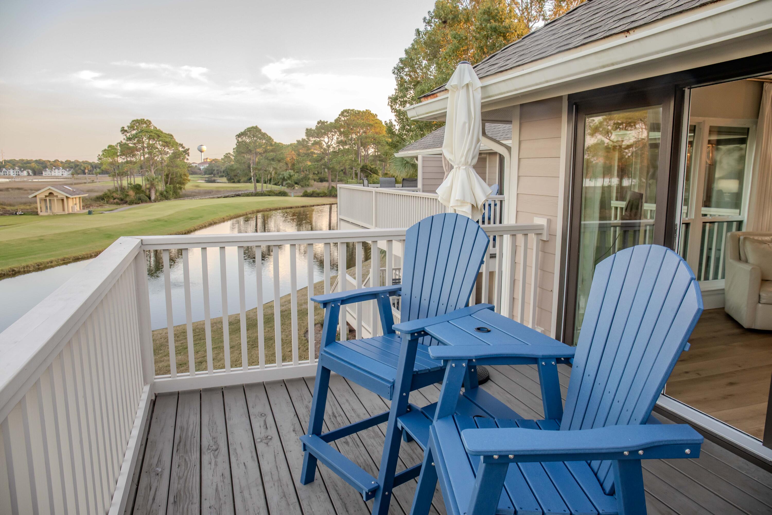 822 Harbour Point Drive, Unit 822 Miramar Beach, FL 32550 - Photo 21 of 41 a view of a chairs on the roof deck