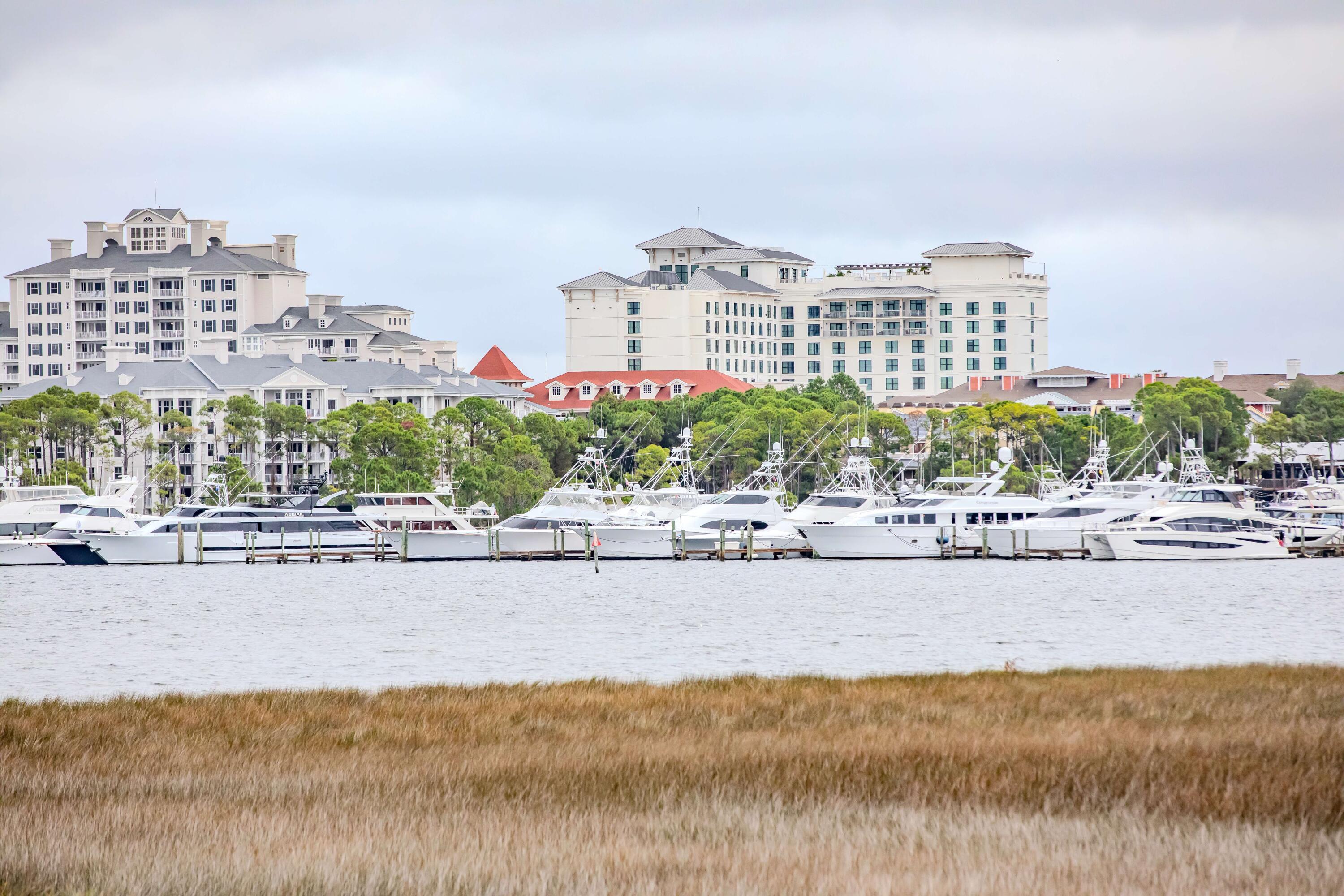 822 Harbour Point Drive, Unit 822 Miramar Beach, FL 32550 - Photo 28 of 41 a view of building with yard and ocean view
