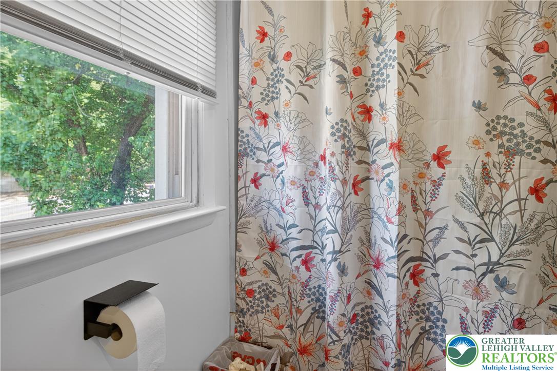 479 South 9th Street Akron, PA 17501 - Photo 14 of 33 Natural light illuminates this cozy bathroom, perfect for unwinding after a long day.