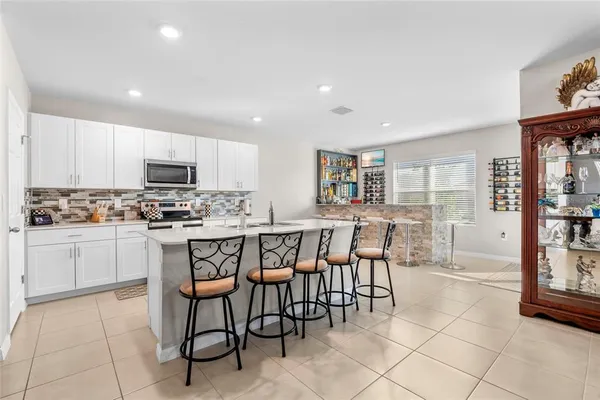 a bedroom with a bed and dresser