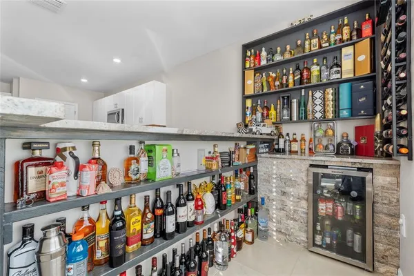 a dining room with furniture and windows