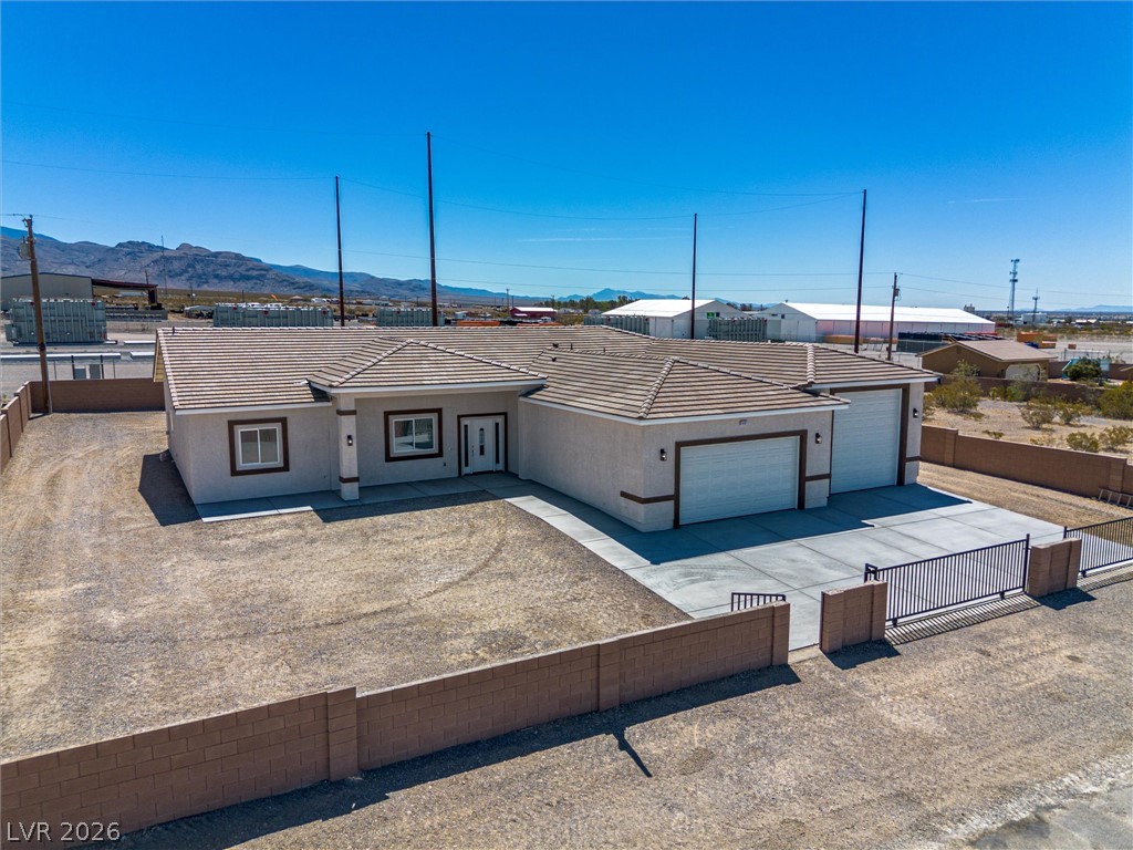 1061 Factory Road Pahrump, NV 89048 - Photo 36 of 41 A desert oasis with a multi-car garage awaits.