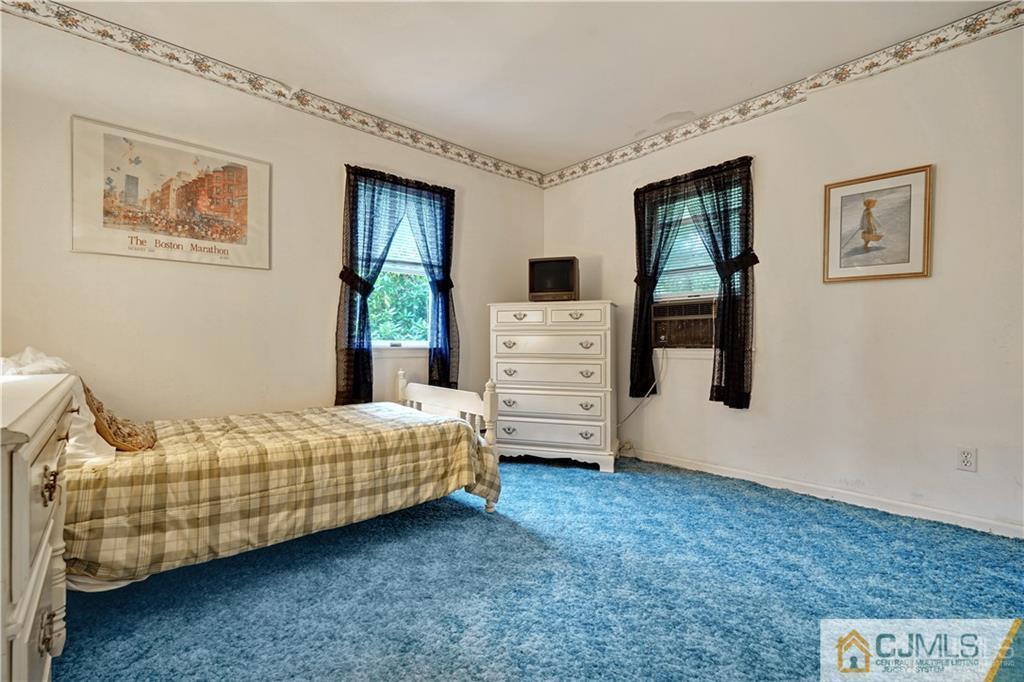 3 Delwood Road Chester, NJ 07930 - Photo 17 of 25 a bedroom with bed and window