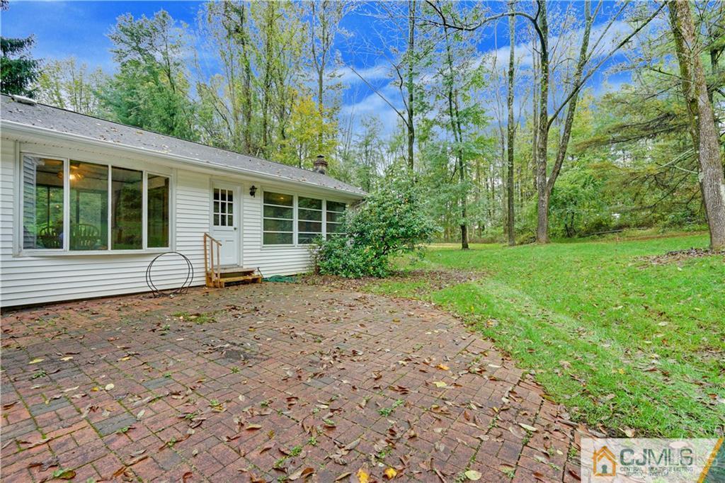 3 Delwood Road Chester, NJ 07930 - Photo 23 of 25 a house with lots of trees