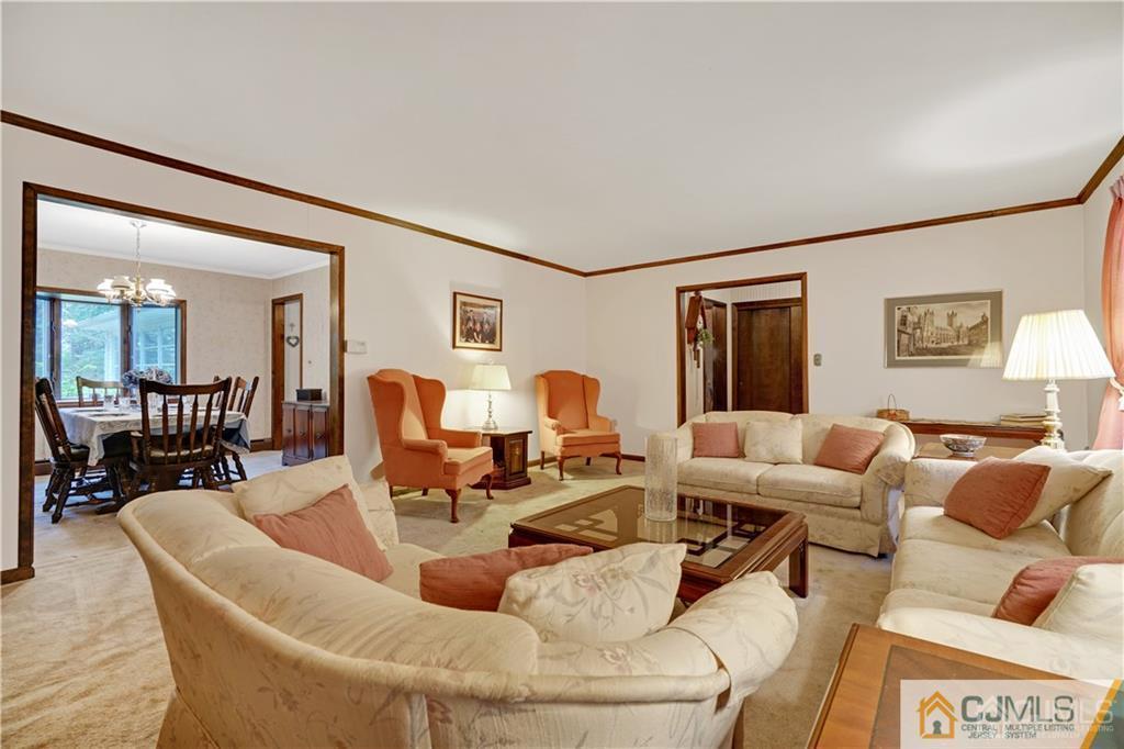 3 Delwood Road Chester, NJ 07930 - Photo 3 of 25 a living room with furniture and a wooden floor