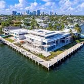 a view of a chairs and table in a terrace