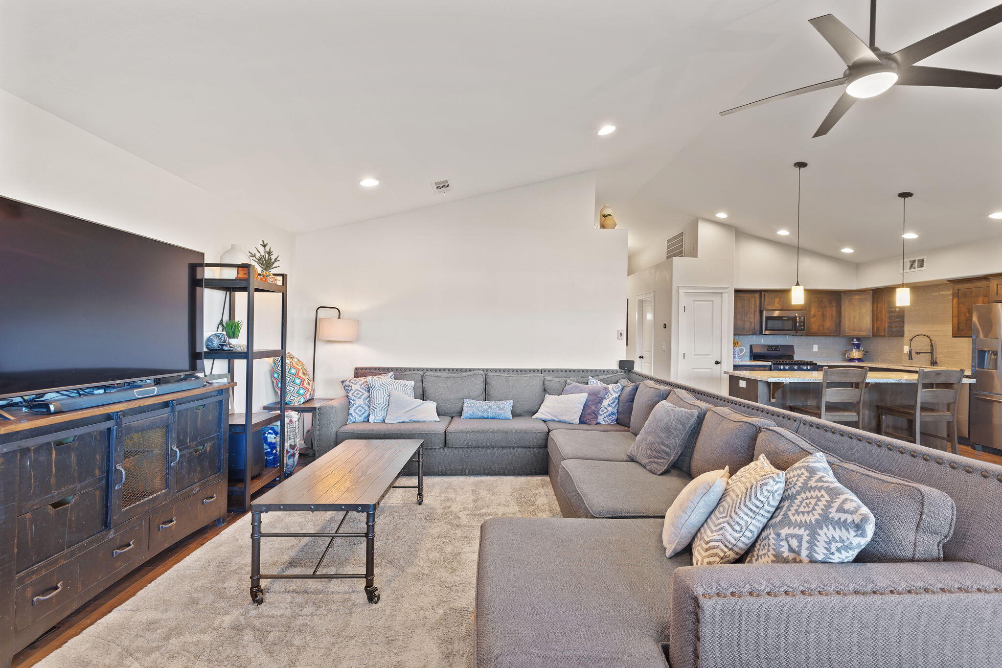 110 Linton Way Eagle Point, OR 97524 - Photo 2 of 41 a living room with furniture and a flat screen tv