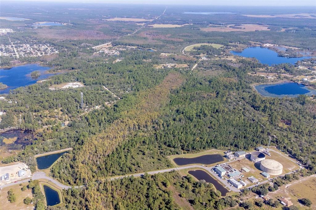 736 Keelhaul Road Osteen, FL 32764 - Photo 15 of 31 an aerial view of a house with a mountain