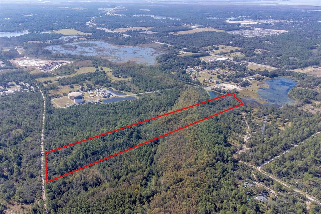 736 Keelhaul Road Osteen, FL 32764 - Photo 26 of 31 an aerial view of a houses with a yard