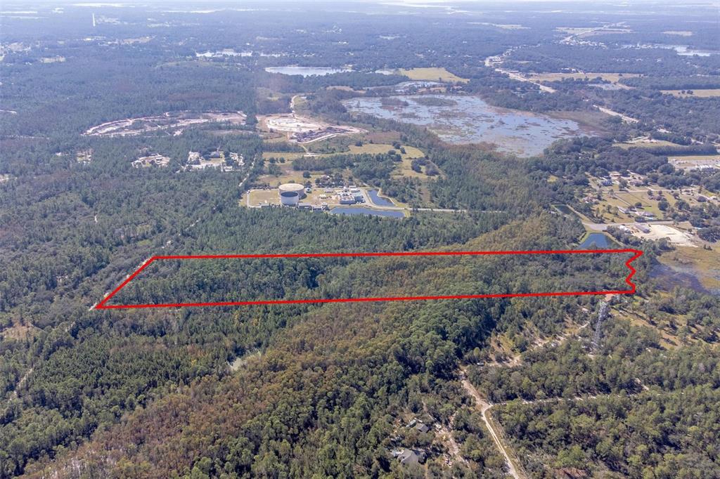 736 Keelhaul Road Osteen, FL 32764 - Photo 27 of 31 an aerial view of a houses with a yard