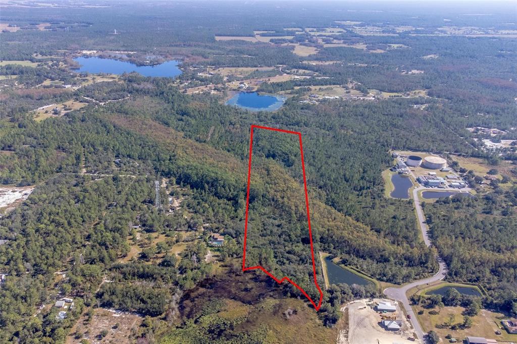 736 Keelhaul Road Osteen, FL 32764 - Photo 29 of 31 an aerial view of residential houses with outdoor space