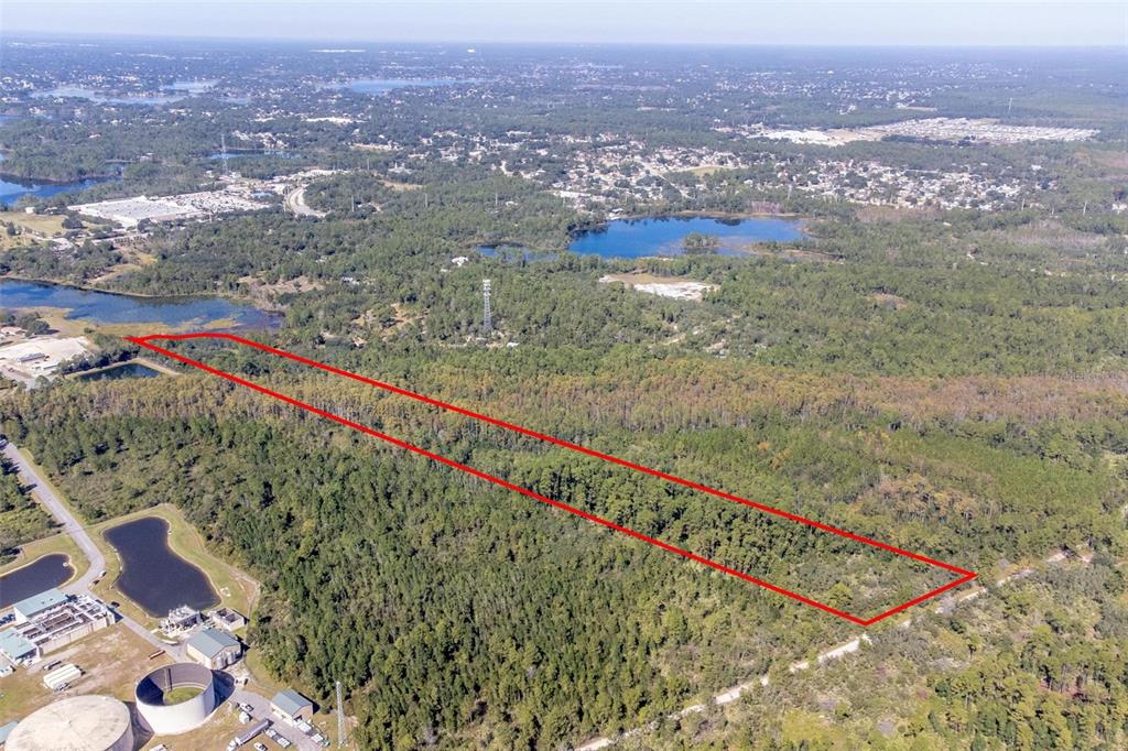 736 Keelhaul Road Osteen, FL 32764 - Photo 3 of 31 a view of a field with an ocean