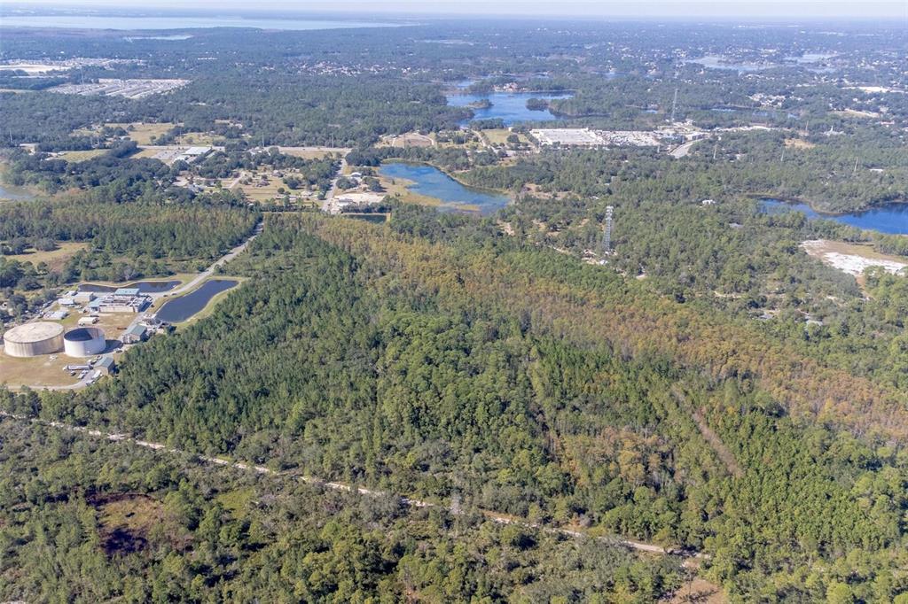 736 Keelhaul Road Osteen, FL 32764 - Photo 6 of 31 an aerial view of residential house and green space